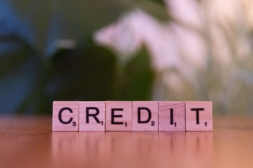 DEBT CONSOLIDATION LOAN Close-up of wooden blocks spelling
