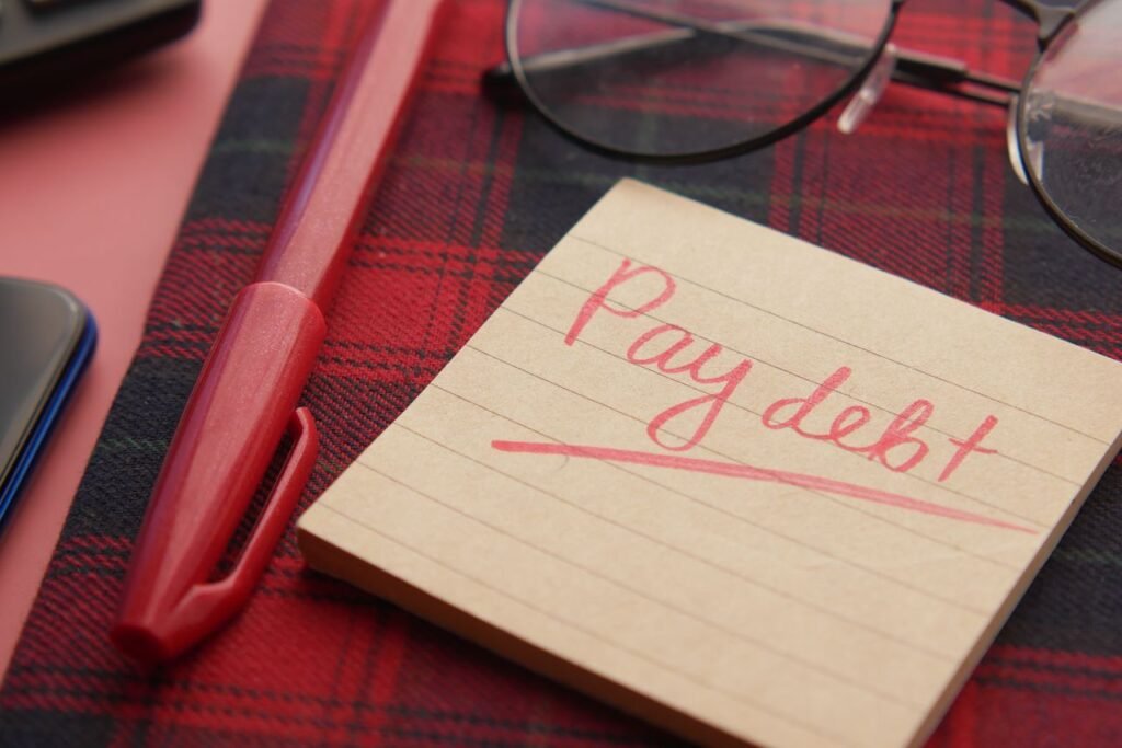 CREDIT DEBT CONSOLIDATION LOAN Close-up of a note reading